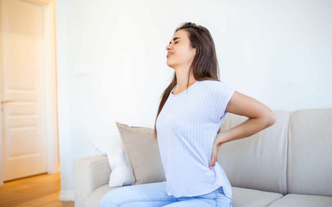 woman-suffering-from-backache-home-lower-back-pain-woman-feels-back-pain-massaging-aching-muscles-sad-woman-suffers-from-lowback (1)