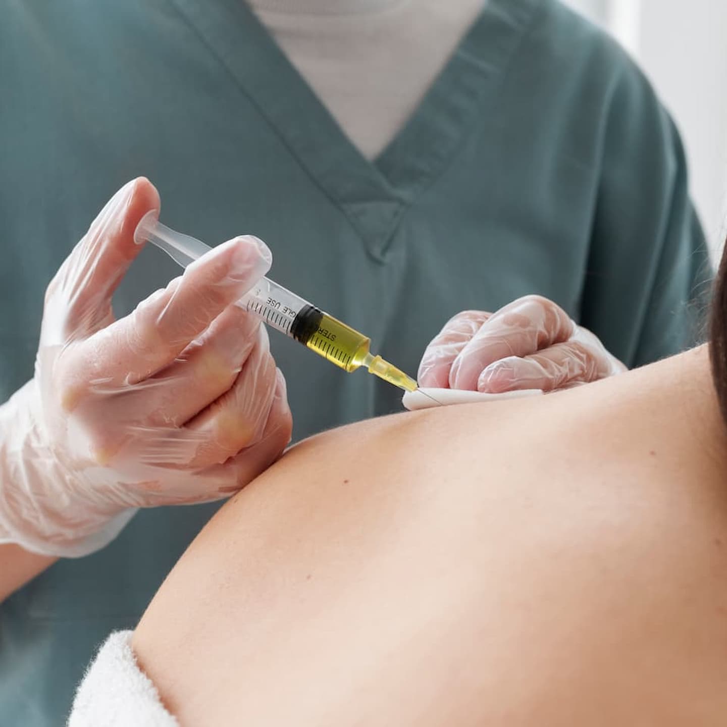 side view healthcare professional injecting neck 2 1 1 8 facet joint injections facet joint injections,joint pain,joint pain relief,facet joint